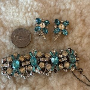 Vintage patented rhinestone bracelet and earring set.  Very old but nice. 8”